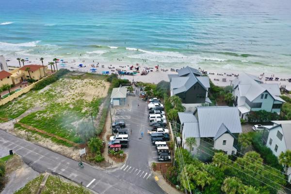 Main beach entrance with bathroom, parking, and bike racks
